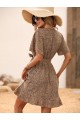 Kadın Kısa Kelebek Kollu Kruvaze Yakalı Belden Kuşaklı Kısa Desenli Süprem Elbise